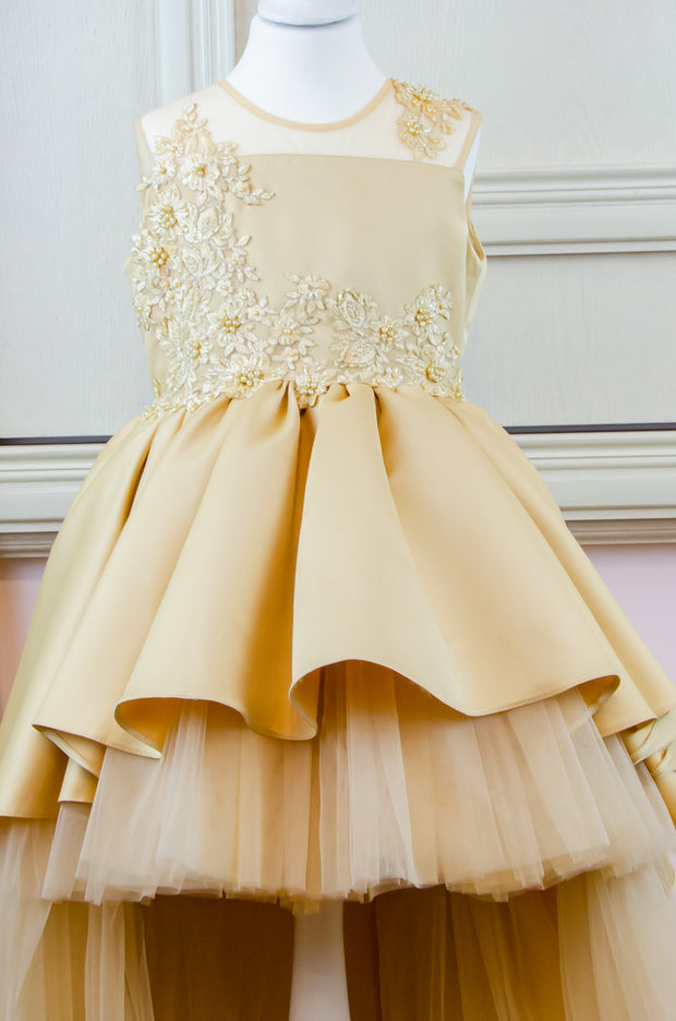 Handmade, festive, girl party dress with a high-low hem, satin train, tulle skirt, floral embroidery and a big satin bow