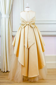 Handmade, festive, girl party dress with a high-low hem, satin train, tulle skirt, floral embroidery and a big satin bow