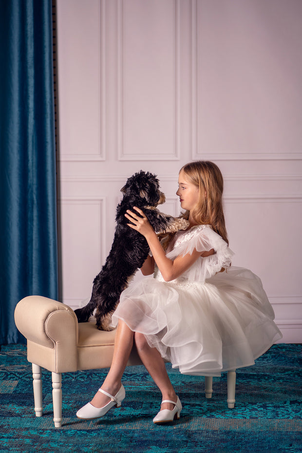 Short white girl tutu dress with a voluminous, ballerina skirt, embroidered tulle top and ruffled tulle sleeves. Handmade girl dress for special occasions: Christmas, New Year's Eve, flower girls, weddings, birthdays, communion.