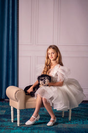 Short white girl tutu dress with a voluminous, ballerina skirt, embroidered tulle top and ruffled tulle sleeves. Handmade girl dress for special occasions: Christmas, New Year's Eve, flower girls, weddings, birthdays, communion.