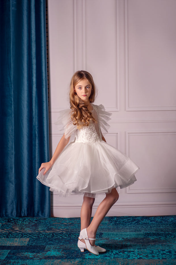 Short white girl tutu dress with a voluminous, ballerina skirt, embroidered tulle top and ruffled tulle sleeves. Handmade girl dress for special occasions: Christmas, New Year's Eve, flower girls, weddings, birthdays, communion.