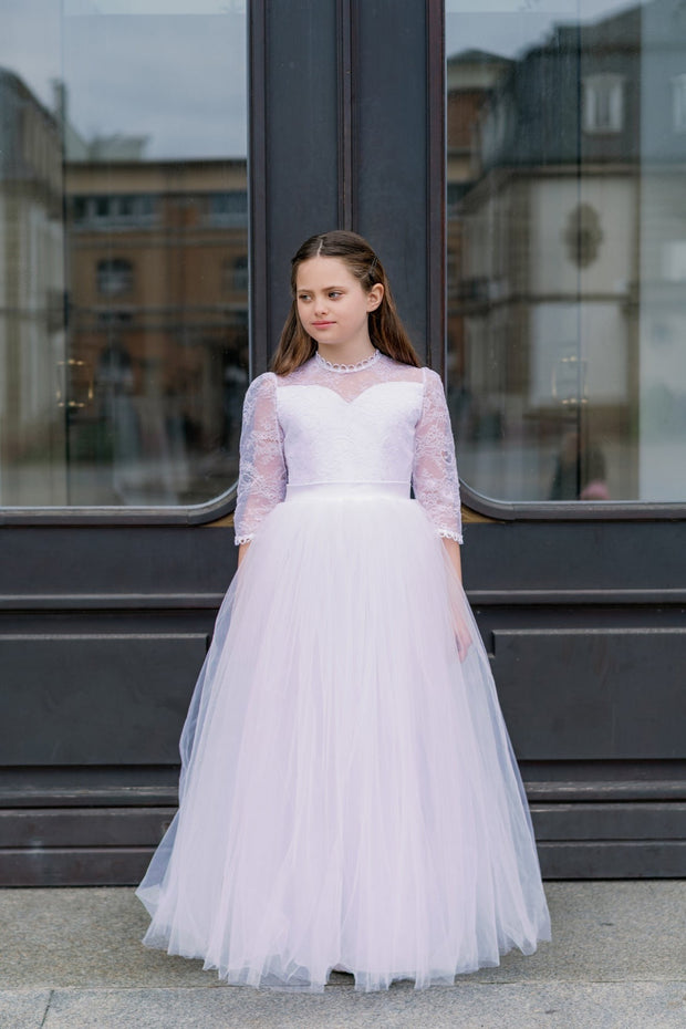 Long, a-line first communion tulle dress in white with long tulle skirt, floral lace top, high collar and 3/4 long transparent sleeves. Handmade with love. Occasions: First Communion, Flower girl, Wedding, Birthday party, and other events. 