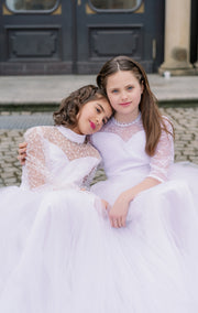 Long, a-line first communion tulle dress in white with long tulle skirt, floral lace top, high collar and long transparent sleeves. Handmade with love. Occasions: First Communion, Flower girl, Wedding, Birthday party, and other events.