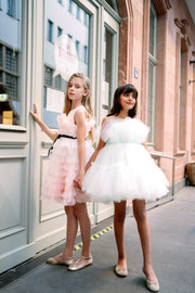 Midi length princess girl dress with ombre effect in white and pink with a ruffled tulle skirt and contrasting black ribbon at the waistline. For special occasions: Wedding, Birthday party, Prom, Flower girl, Eid, and other events.