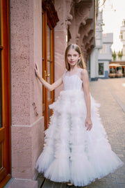 Enchanting fairy tale princess look with a long, white ball gown with voluminous skirt with tulle ruffles and open back. Occasions: Wedding, Birthday party, Prom, Flower girl, Eid, and other events.