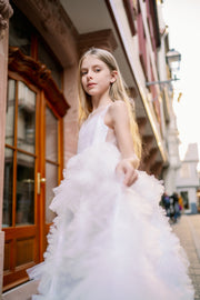 Enchanting fairy tale princess look with a long, white ball gown with voluminous skirt with tulle ruffles and open back. Occasions: Wedding, Birthday party, Prom, Flower girl, Eid, and other events.