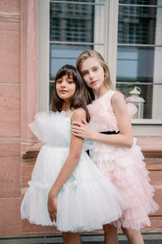 Knee-length elegant girl dress in a light blue colour with a voluminous tulle skirt and top embellished with a pearl ribbon at the waistline. For special occasions: Wedding, Birthday party, Prom, Flower girl, Eid, and other events.