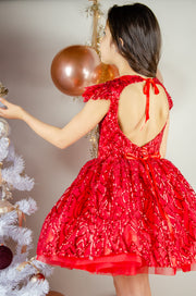 Festive red sequins baby girl dress with open back. The dress is for holiday season, Christmas, New Year, weddings, Eid, birthdays, parties, flower girls and other special formal events and occasions.