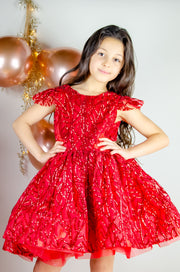 Festive red sequins baby girl dress with open back. The dress is for holiday season, Christmas, New Year, weddings, Eid, birthdays, parties, flower girls and other special formal events and occasions.