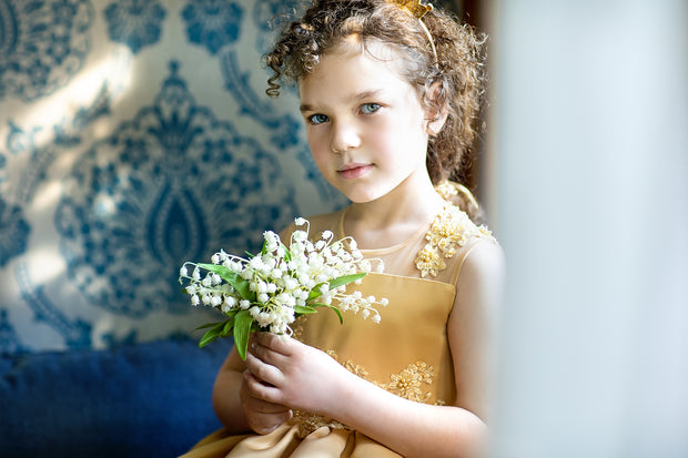 Handmade, festive, girl party dress with a high-low hem, satin train, tulle skirt, floral embroidery and a big satin bow