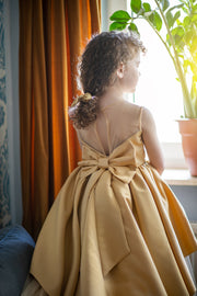 Handmade, festive, girl party dress with a high-low hem, satin train, tulle skirt, floral embroidery and a big satin bow