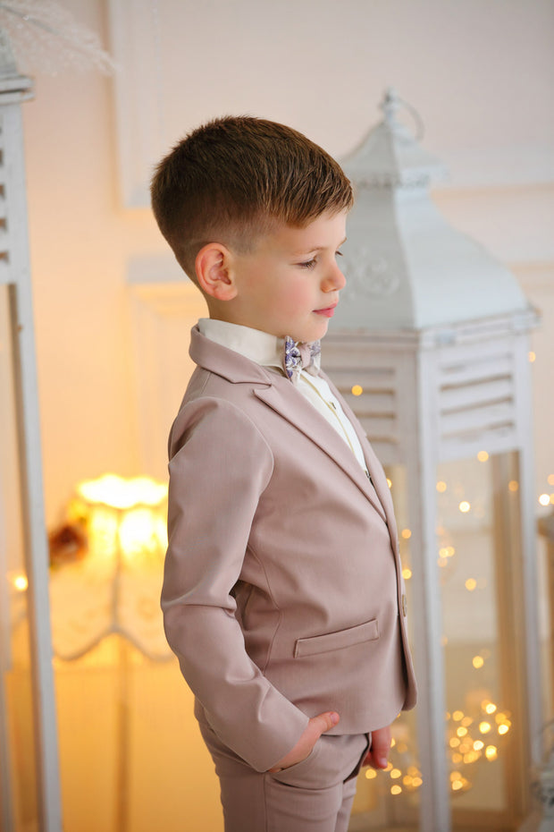 Handmade beige ring bearer boy suit with a beige bow tie and a white shirt
