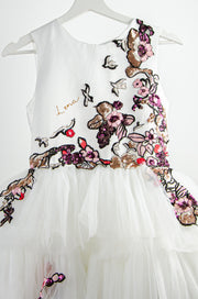 custom made personalised girl dress with a high-low hemline, white tulle skirt and floral sequin embroidery in red and pink