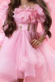 Bright pink high-low hemline girl dress for special occasions. Modern princess girl dress with a bright pink tutu skirt and long tulle train. Satin, long-sleeved top is embellished with gold sequins and feather details. Handmade with love. Occasions: Wedding, Birthday party, Prom, Flower girl, Eid and other events.