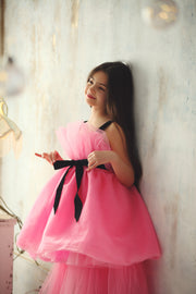 Festive, bright pink high-low hemline girl dress for special occasions. Modern princess girl dress with a bright pink tutu skirt and long tulle train. Black straps and black ribbon at the waistline. Handmade with love. Occasions: Christmas, New Year's Eve, Wedding, Birthday party, Prom, Flower girl, Eid and other events.
