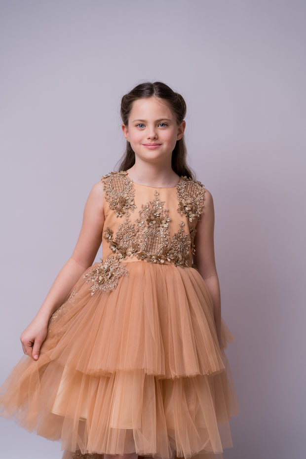 High-low hemline girl princess in a gold brown colour, with a tulle skirt, long tulle train, satin top with gold floral embroidery. For special occasions: Wedding, Birthday party, Prom, Flower girl, Eid, and other events.