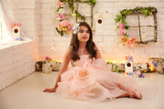 little girl in tulle dress with floral embellishment for special occasions