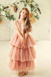 Ankle-length princess dress in a baby pink color with multi-layered tulle skirt, transparent ruffled sleeves and floral embroidery on the front and back satin bodice. Girl dress for special occasions: flower girls, weddings, birthday party, communion, Eid.