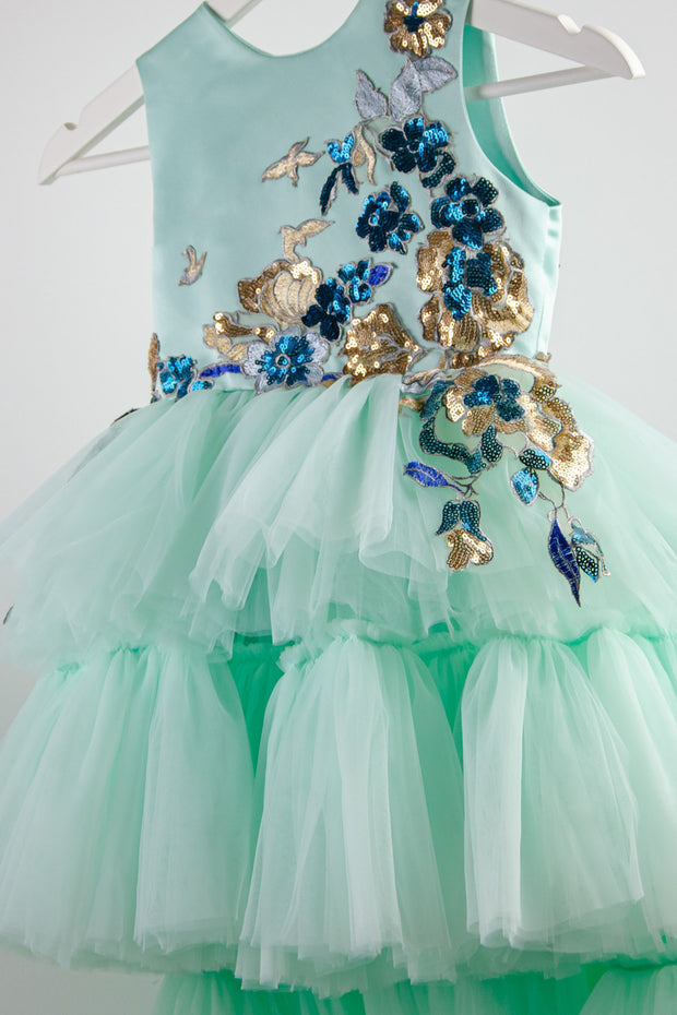 handmade long multi-layered princess tulle dress in mint with gold and blue floral embroidery and sequins, for flower girls, birthdays and weddings