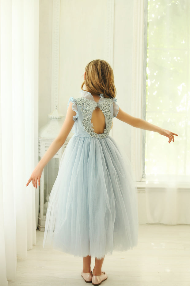 Ankle-length baby blue dress with sleeveless ruffled top, transparent high collar, and pearl embellishments from shoulders down to the open back. Girl dress for flower girls, weddings, birthdays and other special occasions.