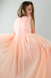 Peach princess dress with a high low skirt and floral embellishments. Perfect for any spring or summer ocassion: weddings, flower girls dress, communion, birthday party, Eid