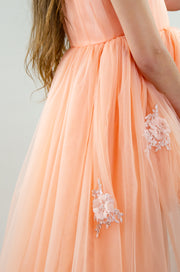 Peach princess dress with a high low skirt and floral embellishments. Perfect for any spring or summer ocassion: weddings, flower girls dress, communion, birthday party, Eid