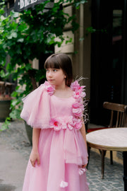 Long pink princess girl dress with a long tulle skirt, asymmetrical sleeves and all-over 3D flower embellishments. For special occasions: flower girls, weddings, Eid, princess birthday party.