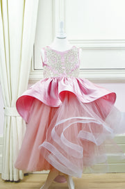 Handmade asymmetrical pink flower girl dress with multi-layer tulle skirt, satin overlay, satin train and gold lace embroidery, for flower girls, weddings, birthdays.