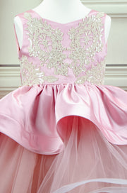 Handmade asymmetrical pink flower girl dress with multi-layer tulle skirt, satin overlay, satin train and gold lace embroidery, for flower girls, weddings, birthdays.