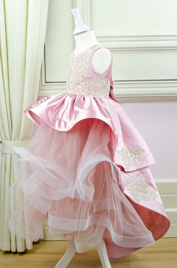 Handmade asymmetrical pink flower girl dress with multi-layer tulle skirt, satin overlay, satin train and gold lace embroidery, for flower girls, weddings, birthdays.