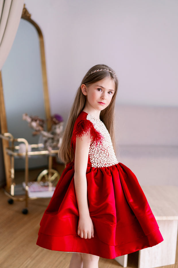 Knee-length elegant girl dress&nbsp;in a deep red colour, with a knee-length satin skirt, satin top with elegant pearl embellishments and feather details on the shoulders. Handmade with love. For special occasions: Wedding, Birthday party, Prom, Flower girl, Eid, and other events.