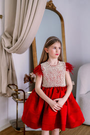 Knee-length elegant girl dress&nbsp;in a deep red colour, with a knee-length satin skirt, satin top with elegant pearl embellishments and feather details on the shoulders. Handmade with love. For special occasions: Wedding, Birthday party, Prom, Flower girl, Eid, and other events.