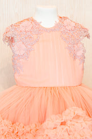 Knee-length multi-layered tulle princess girl dress in a bright salmon colour perfect your spring and summer special occasions: flower girls, weddings, birthday.