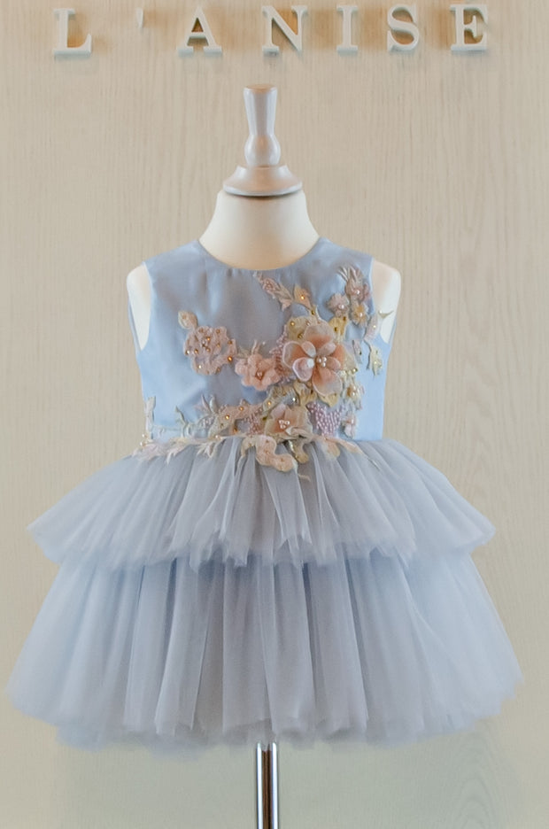 pastel blue girl dress with floral embellishment