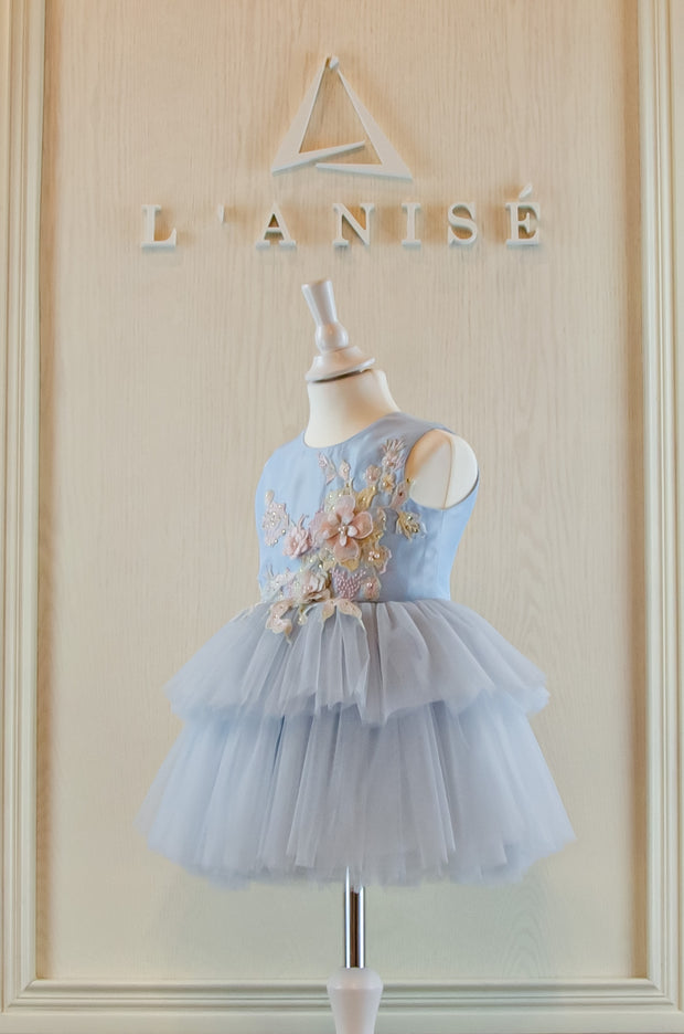 pastel blue girl dress with floral embellishment