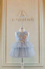 pastel blue girl dress with floral embellishment