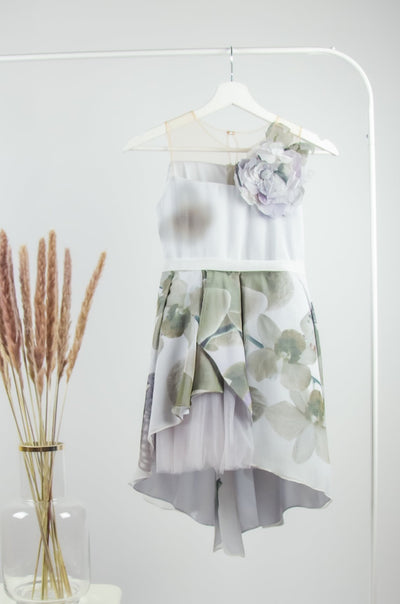 handmade, asymmetrical white and gray baby girl dress for flower girls, weddings, communion, patterned tulle skirt, ribbon at the waistline and a 3D flower on the top