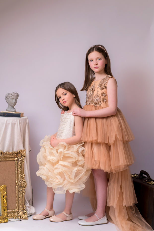 High-low hemline girl princess in a gold brown colour, with a tulle skirt, long tulle train, satin top with gold floral embroidery. For special occasions: Wedding, Birthday party, Prom, Flower girl, Eid, and other events.