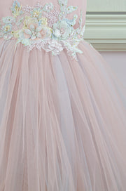 pastel pink little girl dress with multi-layer tulle skirt and floral embellishment for birthday parties and special occasions