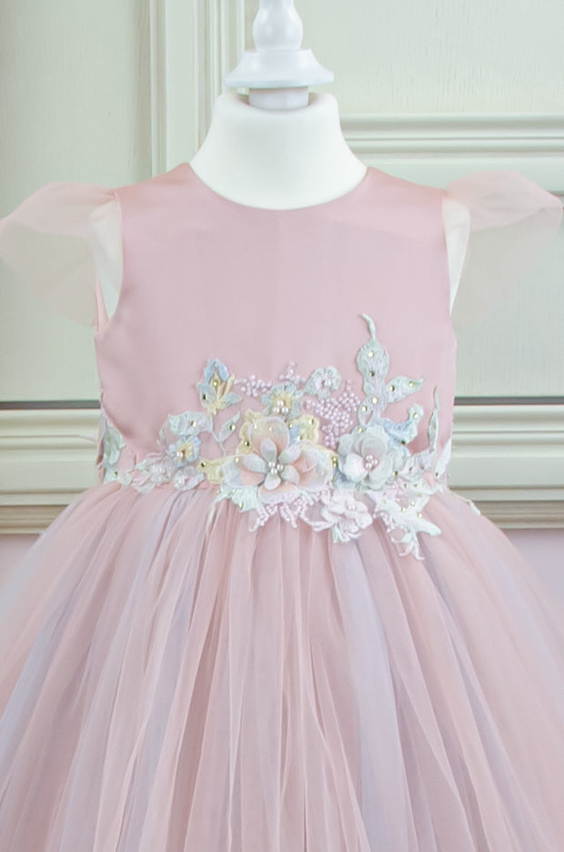 pastel pink little girl dress with multi-layer tulle skirt and floral embellishment for birthday parties and special occasions