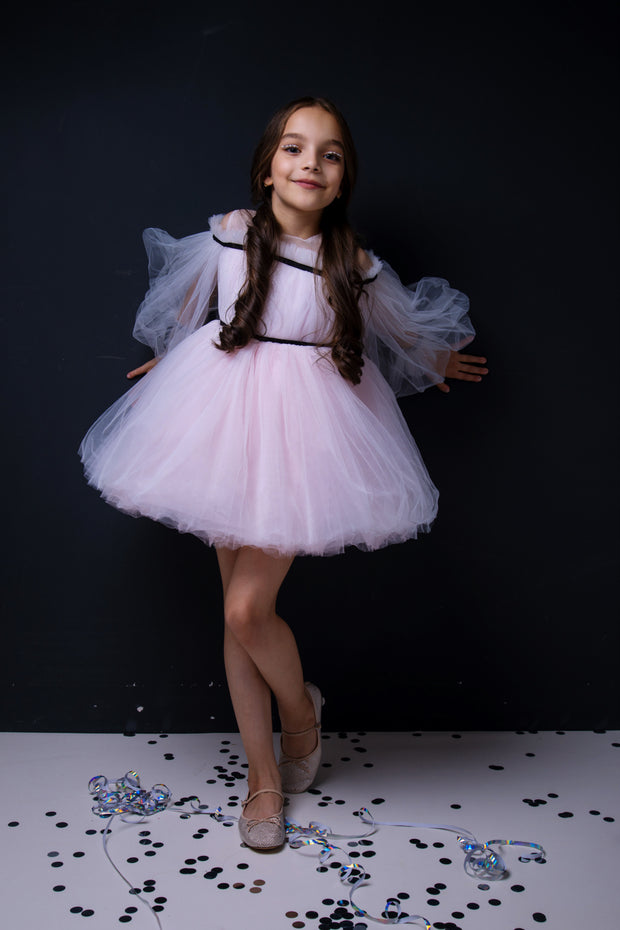 Short baby girl dress in light pink with long tulle sleeves and contrasting black ribbon details for special occasions: Wedding, Birthday party, Prom, Flower girl, Eid, and other events.