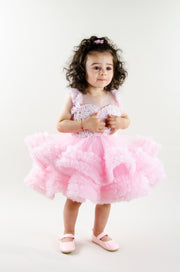 Handmade, bubble gum pink girl tutu dress with a ruffle tulle skirt, satin top embroidered with pearls, for flower girls dresses, girl birthday party, weddings, Eid, New Year's Eve.