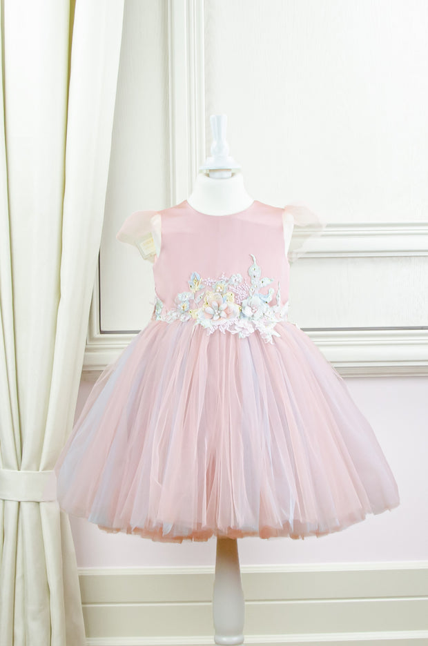 pastel pink little girl dress with multi-layer tulle skirt and floral embellishment for birthday parties and special occasions