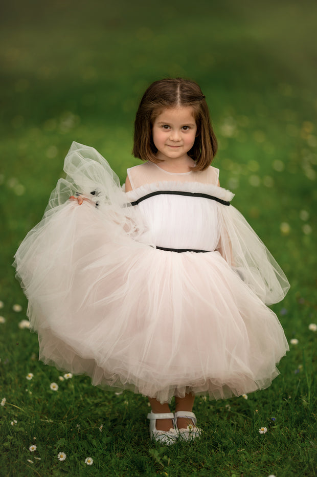 Short baby girl dress in light pink with long tulle sleeves and contrasting black ribbon details for special occasions: Wedding, Birthday party, Prom, Flower girl, Eid, and other events.