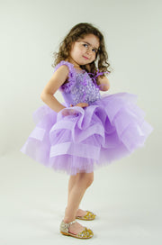 handmade, purple baby girl tutu dress with a voluminous tulle skirt, satin top embroidered with crystals and pearls and ruffle tulle details, flower girl dress, weddings, girl birthday party, Eid, Christmas or New Year's eve girl dress.