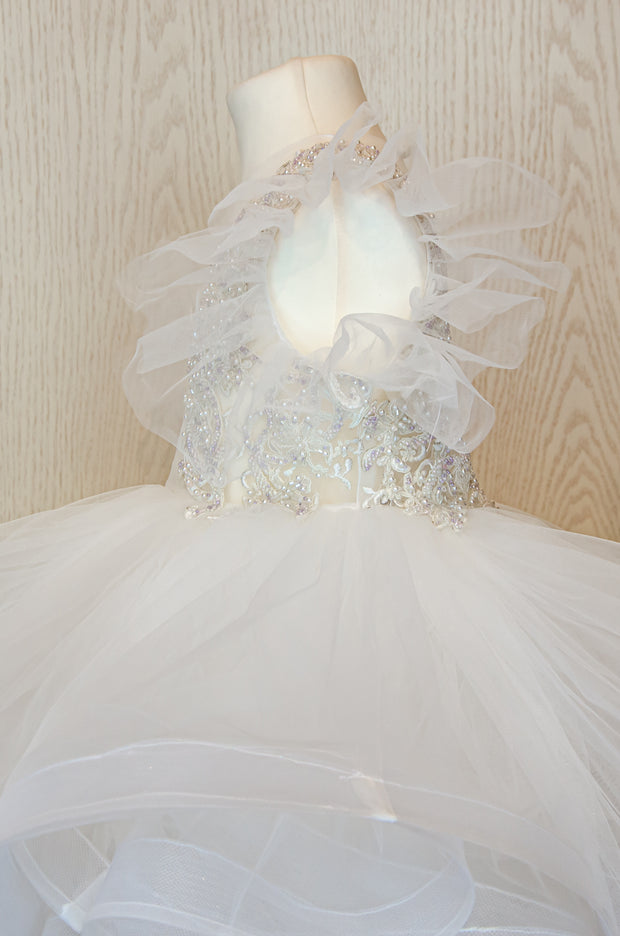 Short white girl tutu dress with a voluminous, ballerina skirt, embroidered tulle top and ruffled tulle sleeves. Handmade girl dress for special occasions: flower girls, weddings, birthdays, communion.