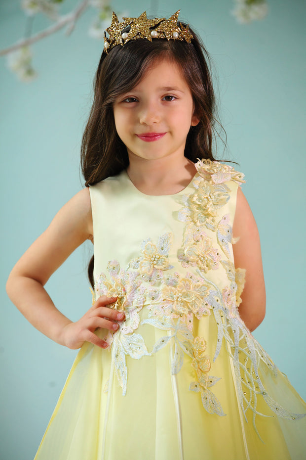 handmade short A-line yellow flower girl dress with a short tulle skirt and hand embroidered top with pastel flowers, pearls and rhinestones