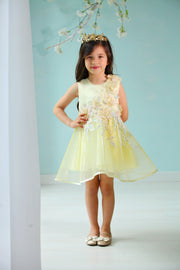 handmade short A-line yellow flower girl dress with a short tulle skirt and hand embroidered top with pastel flowers, pearls and rhinestones