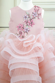 handmade, blush pink flower girl dress with a voluminous, multi-layer tulle skirt with floral embroidery