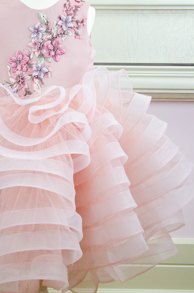 handmade, blush pink flower girl dress with a voluminous, multi-layer tulle skirt with floral embroidery